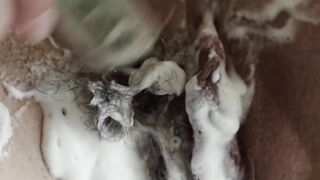 Sensual babe Laurene K shaves her wet hairy pussy solo