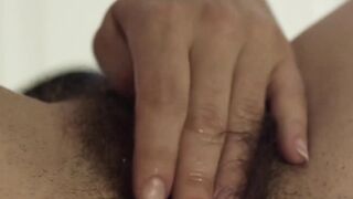 Sensual babe Laurene K shaves her wet hairy pussy solo