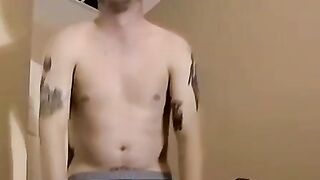 Cute amateur Jack with glasses masturbates on a leather sofa
