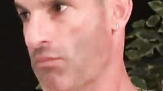 Muscular construction worker relaxes with solo stroking
