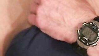Muscular construction worker relaxes with solo stroking