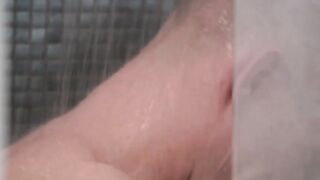 Big dicked jock takes a shower before taking a stroke