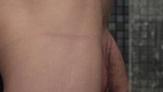 Big dicked jock takes a shower before taking a stroke