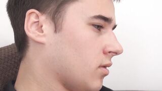 Young man plays with his beautiful feet while masturbating