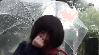 Cute Japanese chick has vibrator pleasing her in the rain