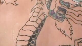 Muscular Renan flexes his abs while playing with his cock