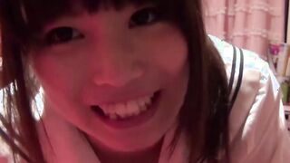Petite Japanese schoolgirl rubs her soft pussy and nipples