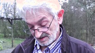 Cute babe rides old mans dick cowgirl style by the campfire
