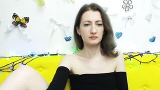 Amateur babe flashes tits under top on webcam