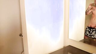 Tattooed dude catches his friend while jerking his sausage