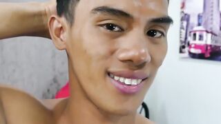 Adorable twink beating his meat and playing with his feet