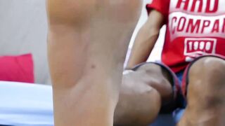Adorable twink beating his meat and playing with his feet