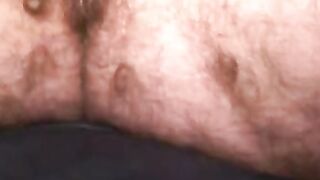 Curly amateur works on his cock and blasts out a load