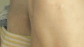 Young and oblivious Japanese babe is filmed by secret cam