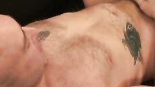 Inked bald guy shows off cock stroking skills and cumshot