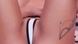 Blonde changes thongs and sucks dildo on webcam