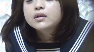 Japanese schoolgirl plays with her vagina in her own uniform