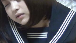 Japanese schoolgirl plays with her vagina in her own uniform