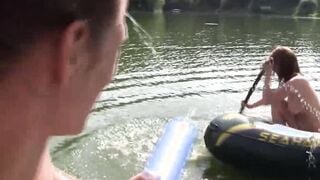 Group of naughty teens is having fun while swimming outdoor