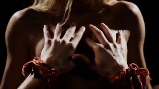 Couple fucking erotically while being covered in water drops