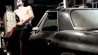Young mechanic takes a break from work to jack off his cock