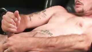Rough looking amateur makes his thick dick spray cum