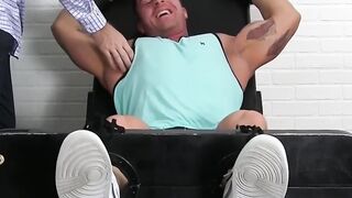 Muscular hunk tied up and feet worshiped by a deviant