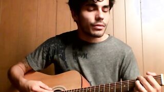 Handsome young man enjoys his guitar and jerkoff solo
