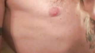 Mature and beefy gay shows off tattoo and masturbation