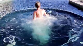 Blonde twink Tyler Thayer jerking his cock near the pool