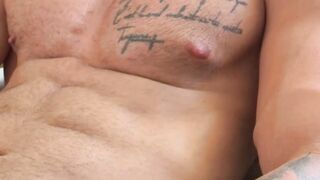 Buffed up guy strokes his hard cock and shows his hard abs