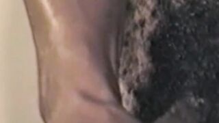 Muscled stallion masturbates his hairy cock in retro solo