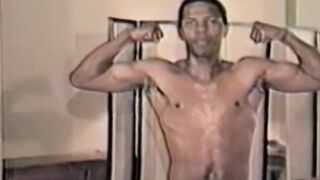 Muscled stallion masturbates his hairy cock in retro solo