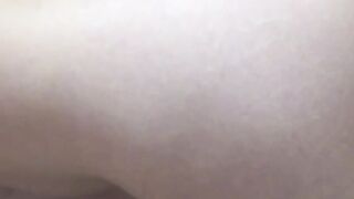 Japanese babe filmed while she fingers her hairy pussy