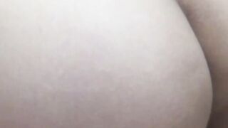 Japanese babe filmed while she fingers her hairy pussy