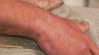 Hairy mature gay jerks off while smoking and shoots his load