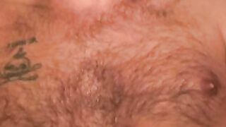 Hairy mature gay jerks off while smoking and shoots his load