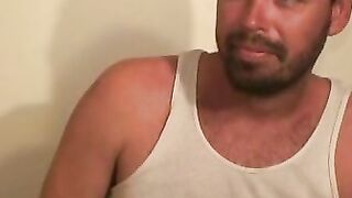 Hairy mature gay jerks off while smoking and shoots his load