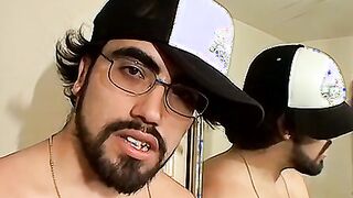 Bearded straight thug strokes his big hairy cock and cums
