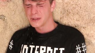 Blond twink fed with two dicks out in the open