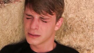 Blond twink fed with two dicks out in the open