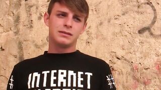 Blond twink fed with two dicks out in the open