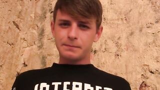 Blond twink fed with two dicks out in the open