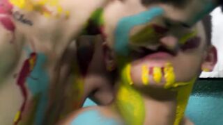 Colorful twink gets feet painted in blowjob induced cum