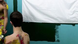Colorful twink gets feet painted in blowjob induced cum
