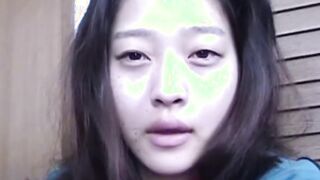 Adorable Japanese chick sits on the toilet and pees in a cup