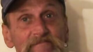 Bearded mature homo jerks off his big dick and comes hard