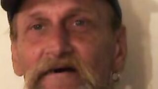 Bearded mature homo jerks off his big dick and comes hard