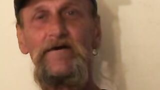 Bearded mature homo jerks off his big dick and comes hard