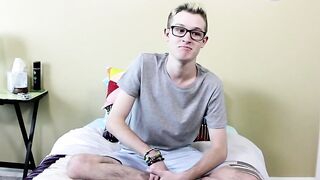 Casting twink jerks his enormous cock while spreading and rubbing his ass